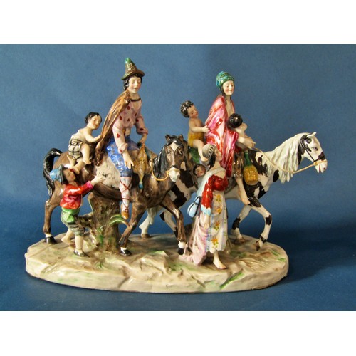 1063 - A large Naples porcelain figure group, figures on horseback with children in attendance, 21 cm high,... 