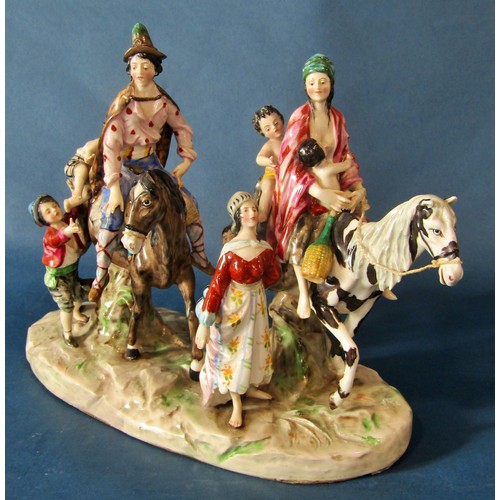 1063 - A large Naples porcelain figure group, figures on horseback with children in attendance, 21 cm high,... 