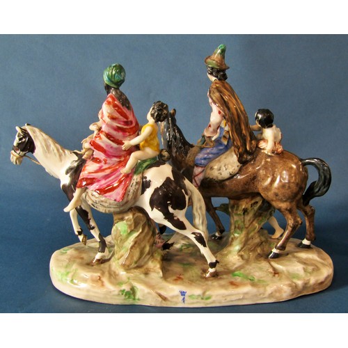 1063 - A large Naples porcelain figure group, figures on horseback with children in attendance, 21 cm high,... 