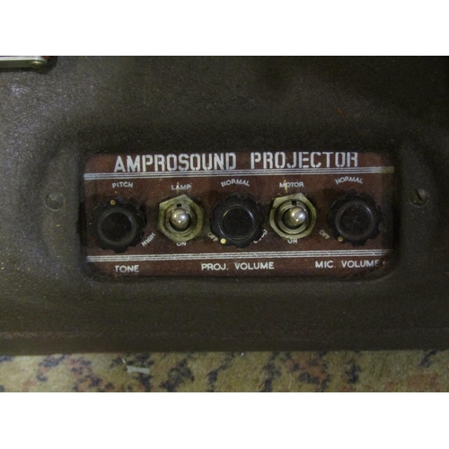 2178 - A cased Ampro precision projector