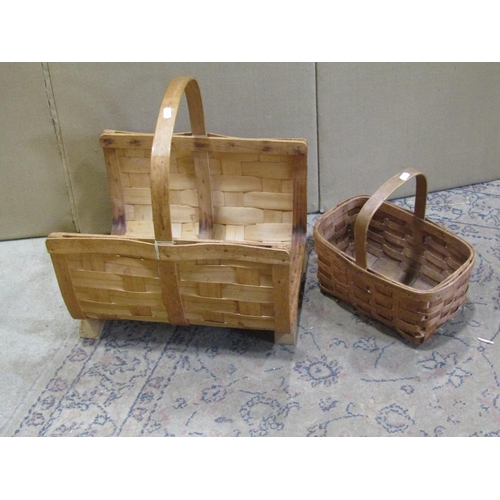 2188 - An American wicker log basket with central handle and a further wicker basket (2)