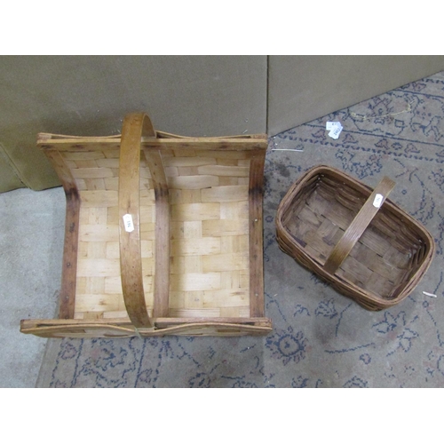 2188 - An American wicker log basket with central handle and a further wicker basket (2)