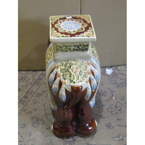 2191 - A Chinese style ceramic garden seat in the form of an elephant with sancai style glazed finish, 42cm... 