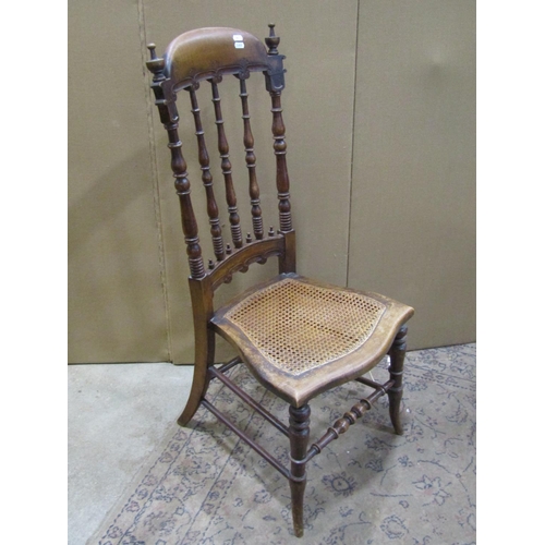 2199 - A 19th century Windsor lath back elbow chair together with a Victorian spindle back chair with cane ... 