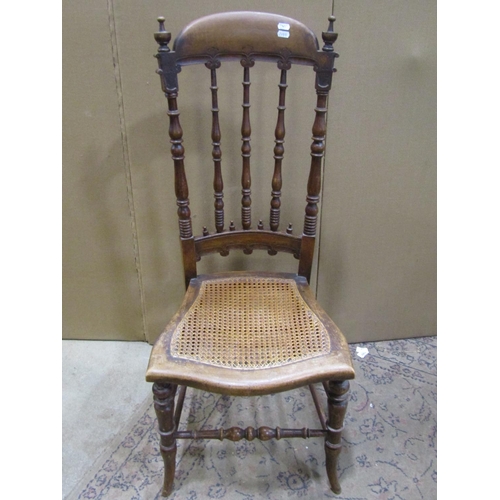 2199 - A 19th century Windsor lath back elbow chair together with a Victorian spindle back chair with cane ... 