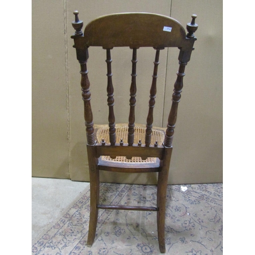 2199 - A 19th century Windsor lath back elbow chair together with a Victorian spindle back chair with cane ... 