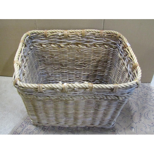 2203 - A large wicker and rope work log basket, 60 cm high, 78 x 55 cm