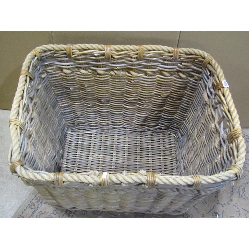 2203 - A large wicker and rope work log basket, 60 cm high, 78 x 55 cm