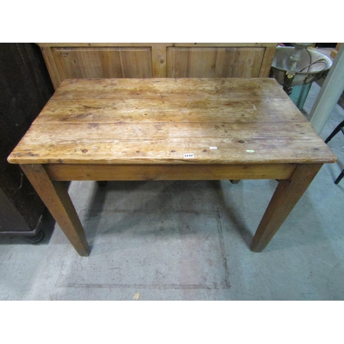 2242 - A small rustic scrubbed, pine farmhouse table, with planks top above a single frieze drawer, 71 cm h... 