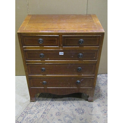 2250 - A good quality reproduction mahogany chest of two short and three short drawers, of diminutive propo... 