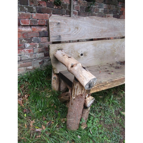 2036 - A rustic two seat garden bench with thick heavy boarded seat and back 146 cm wide