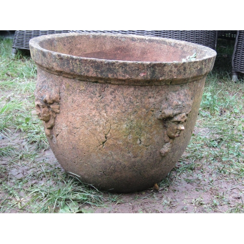 2073 - A pair of weathered buff coloured terracotta circular tapered planters with moulded rims and repeati... 