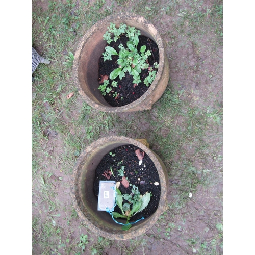 2073 - A pair of weathered buff coloured terracotta circular tapered planters with moulded rims and repeati... 