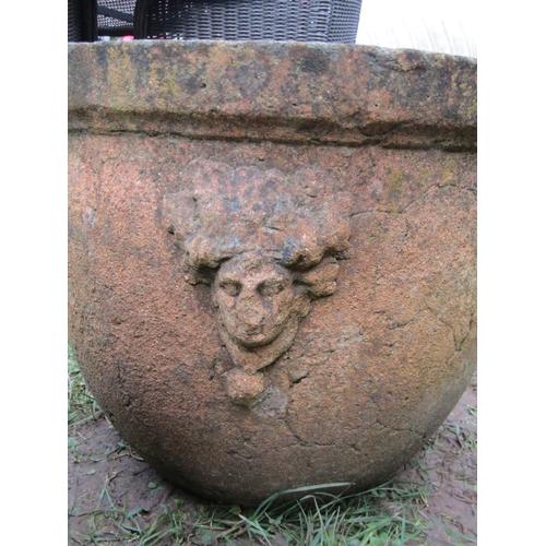 2073 - A pair of weathered buff coloured terracotta circular tapered planters with moulded rims and repeati... 