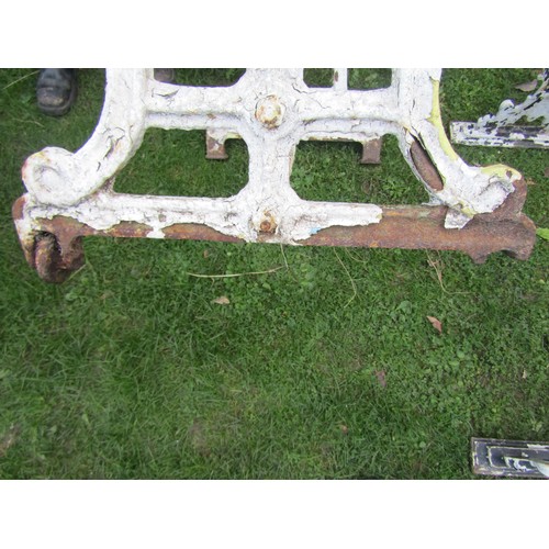 2085 - A pair of cast iron table bases, 67cm high, 36 x 96 together with another 65cm high, 44 x 91cm (3)