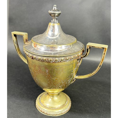 1152 - A Tiffany & Co silver plated twin-handled lidded trophy cup, with applied badge to underside ‘Tiffan... 