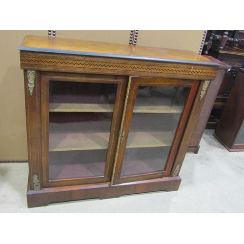 2294 - A 19th century walnut hall cabinet, with parquetry inlaid frieze and applied gilt metal mounts flank... 