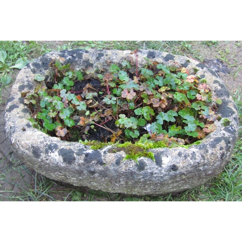 2074 - A weathered cast composition stone garden urn the circular lobed bowl with egg and dart flared rim r... 