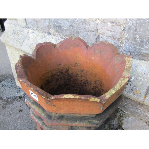 2115 - A pair of 19th century, moulded, terracotta chimney pots with geometric panelled motifs, 74cm high.