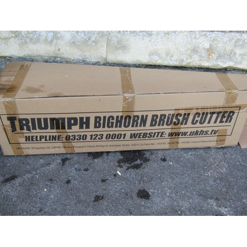 2135 - A Triumph Bighorn brush cutter, (with box and paperwork)