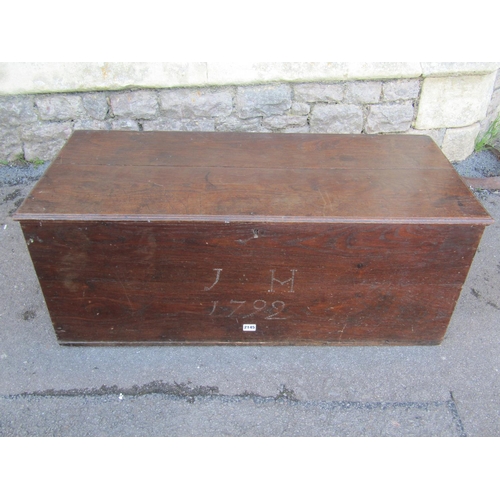 2145 - A simple late 18th century elm and oak chest / coffer, initialled ‘J.H’ and dated 1792 to front, 39 ... 