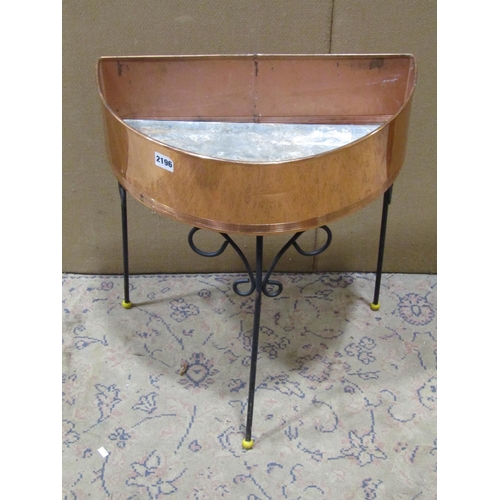 2196 - A mid 20th century demi-lune shaped copper planter with fixed coated steel supports, 50 cm wide x 30... 