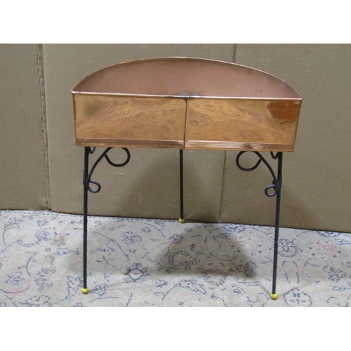 2196 - A mid 20th century demi-lune shaped copper planter with fixed coated steel supports, 50 cm wide x 30... 