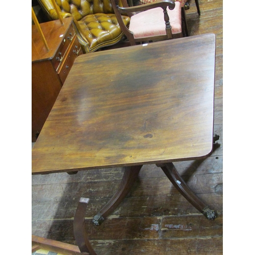 2733 - Georgian mahogany snap top breakfast table. 120cm x 95cm. On turned pillar and quadruped