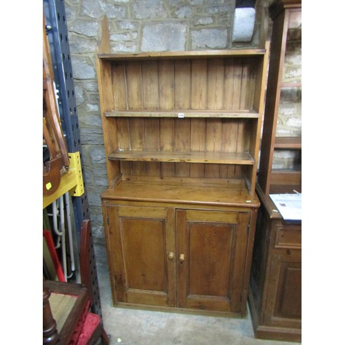 2209 - A late 19th / early 20th century pine dresser of diminutive proportions, with twin-panelled doors, a... 