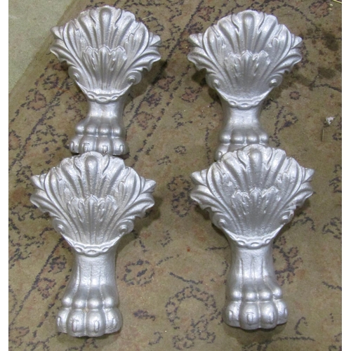 2141 - Four good quality cast iron bath feet, lion paw and acanthus form, each 26cm high