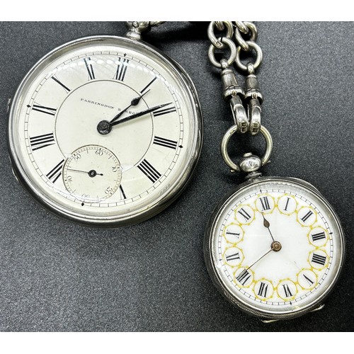 1239 - A mixed selection of silver, including a cigarette case, two pocket watches on chains, a single fob ... 