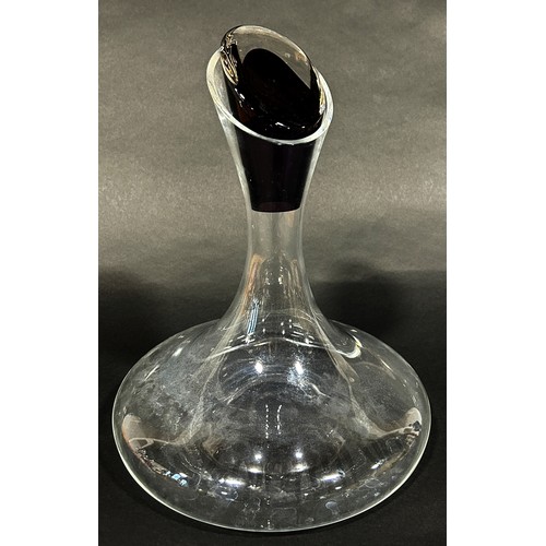 1101 - Six tall large wine glass with a purple stain leaking into the slender stems, a flat bottomed carafe... 