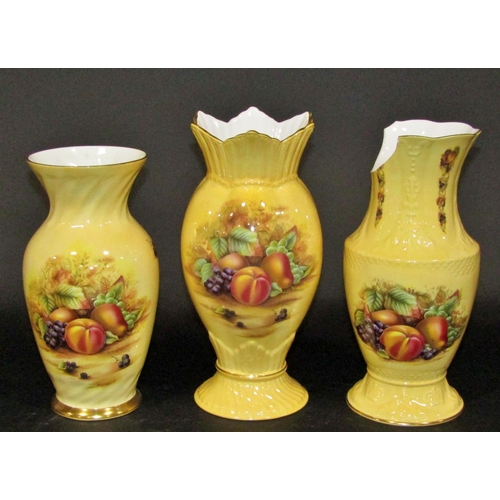 1061 - 13 Aynsley Orchard Gold wares comprising vases, dishes, mantle clock, etc,