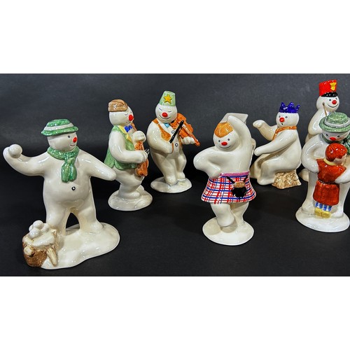 1085 - A 12 piece Royal Doulton 'Snowman' figures, band, drummer, snow balling, etc