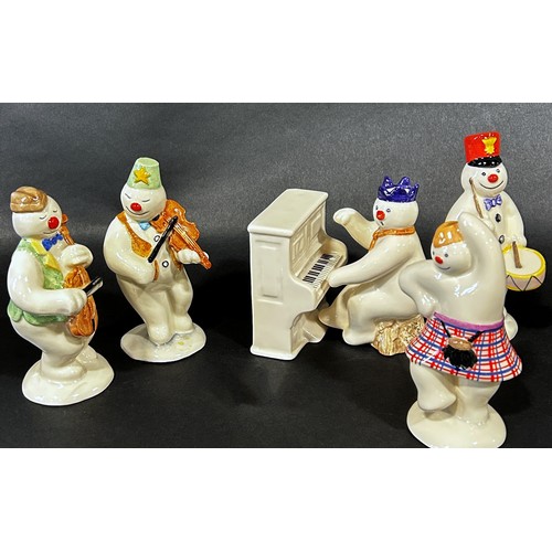 1085 - A 12 piece Royal Doulton 'Snowman' figures, band, drummer, snow balling, etc