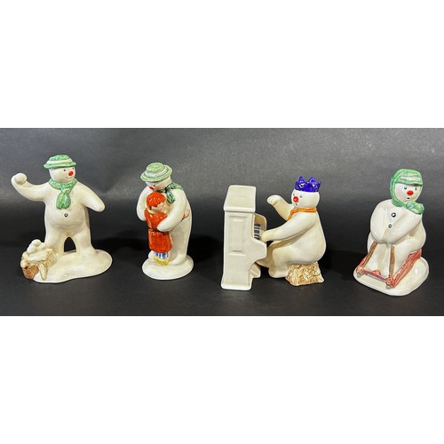 1085 - A 12 piece Royal Doulton 'Snowman' figures, band, drummer, snow balling, etc