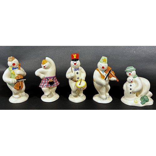 1085 - A 12 piece Royal Doulton 'Snowman' figures, band, drummer, snow balling, etc