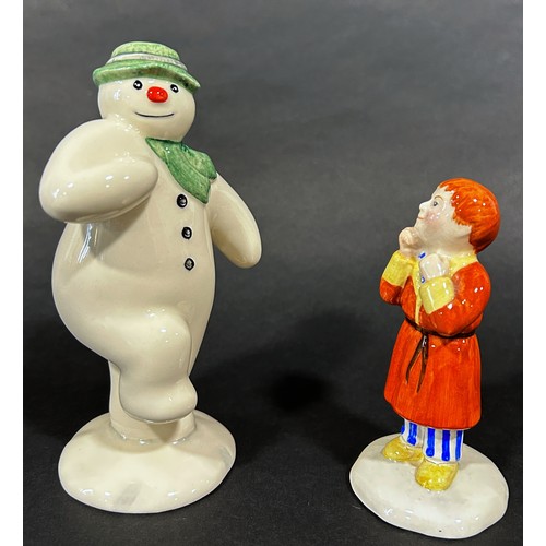 1085 - A 12 piece Royal Doulton 'Snowman' figures, band, drummer, snow balling, etc