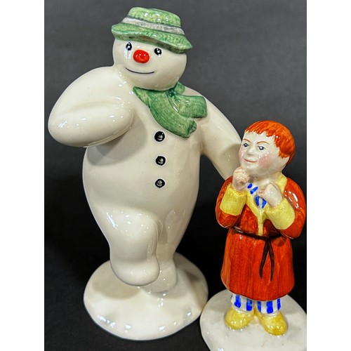 1085 - A 12 piece Royal Doulton 'Snowman' figures, band, drummer, snow balling, etc