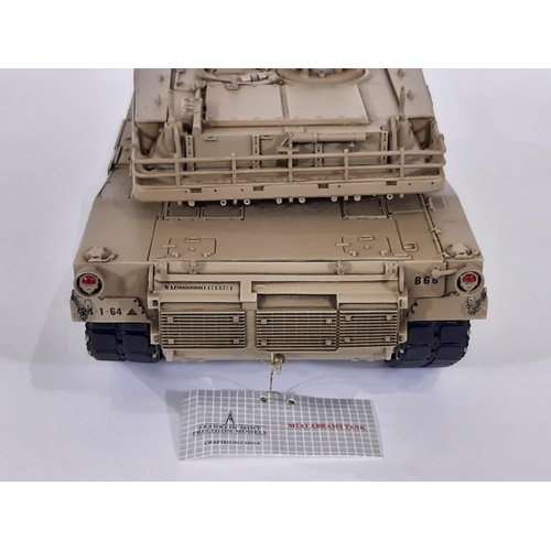 348 - M1A1 Abrams Tank 1:24 scale model by Franklin Mint in desert sand colour. With original packaging an... 