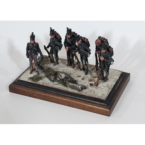 357 - Four display models of 19th century battle scenes including Napoleonic War Riflemen carrying the Kin... 