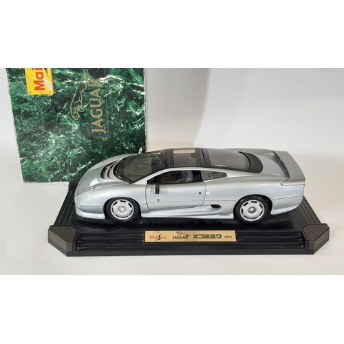 347 - 8 large scale boxed models of classic cars including 1:12 Jaguar XJ220 by Maisto, five 1:18 models b... 