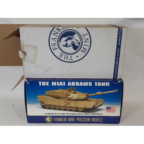 348 - M1A1 Abrams Tank 1:24 scale model by Franklin Mint in desert sand colour. With original packaging an... 