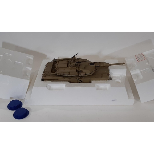 348 - M1A1 Abrams Tank 1:24 scale model by Franklin Mint in desert sand colour. With original packaging an... 