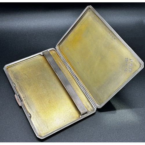 1188 - A silver and gold engine turned cigarette case, Birmingham 1949, maker John Rose, 7oz approximately