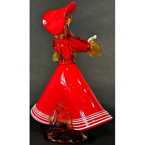 1108 - A Murano glass lady wearing a flared red A line dress with gold ruffled sleeves and flamboyant match... 