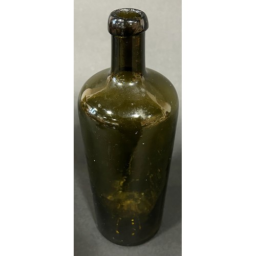 1109 - An 18th century green glass bottle, 26cm high.