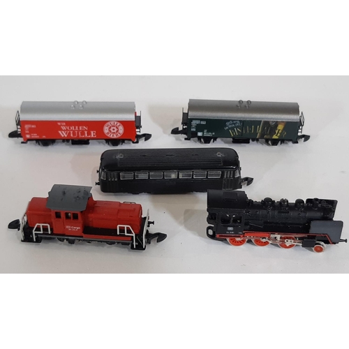 363 - Collection of Z gauge railway models comprising locomotives, coaches, rolling stock, track, transfor... 