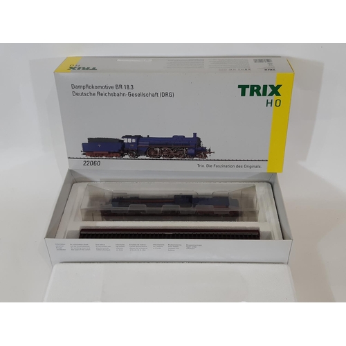 377 - HO gauge 4-6-2 German steam locomotive and tender by Trix no 22060, boxed with all internal packagin... 