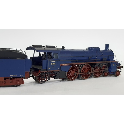 377 - HO gauge 4-6-2 German steam locomotive and tender by Trix no 22060, boxed with all internal packagin... 